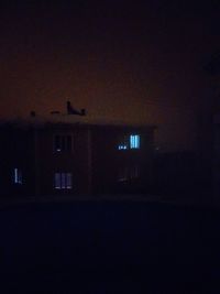 Silhouette of building at night