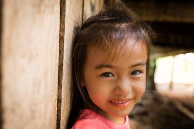 Close-up portrait of smiling girl