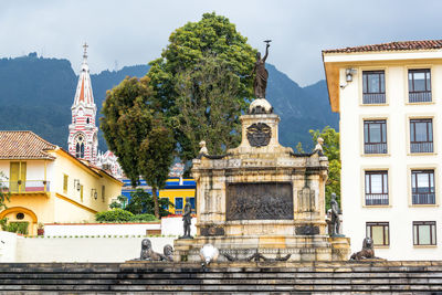 Historic monument with el carmen church in background