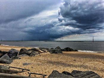 Scenic view of beach against sky