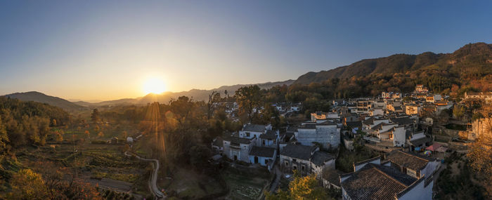 High angle view of townscape against sky during sunset