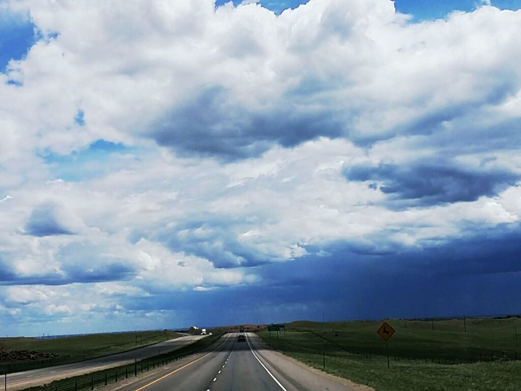 sky, cloud - sky, the way forward, cloudy, landscape, road, transportation, cloud, diminishing perspective, field, tranquil scene, vanishing point, tranquility, nature, scenics, beauty in nature, horizon over land, country road, rural scene, cloudscape