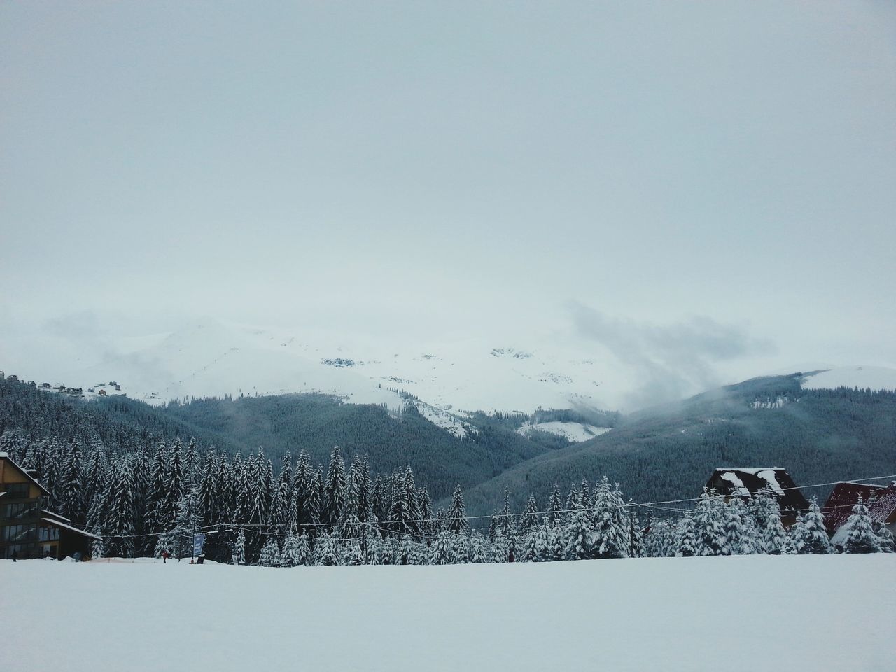 winter, mountain, weather, cold temperature, snow, tranquil scene, scenics, sky, tranquility, beauty in nature, nature, fog, landscape, copy space, water, season, lake, mountain range, day