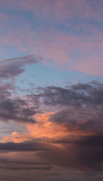 Low angle view of dramatic sky during sunset