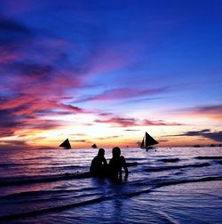 Scenic view of sea at sunset