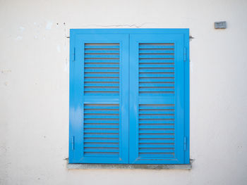 Blue closed door of building