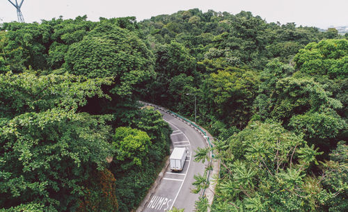 High angle view of truck on road amidst trees