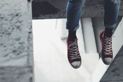 Low section of man standing on floor