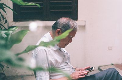 Young man using mobile phone