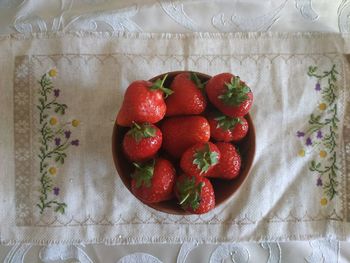 High angle view of strawberries on table