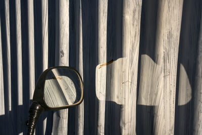 Reflection of shutter on side-view mirror