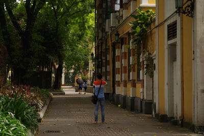 People walking on street in city