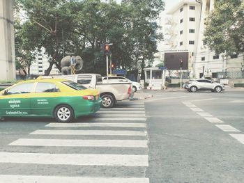 View of cars on city street