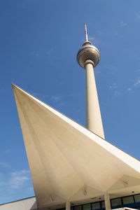 Low angle view of building against clear blue sky