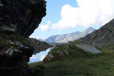 Scenic view of mountains and lake against sky