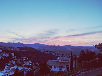 High angle view of townscape against sky during sunset