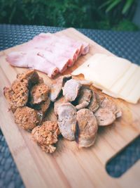 High angle view of bread on cutting board