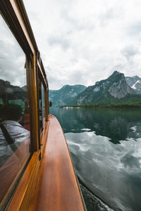 Close-up of boat on mountain against sky