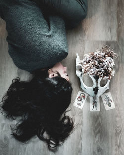 High angle view of woman standing against wall