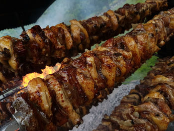 Close-up of meat on barbecue grill