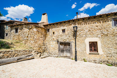 Exterior of old building against sky