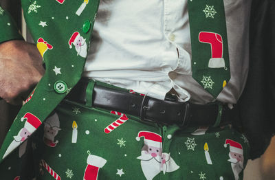 Midsection of woman standing in car