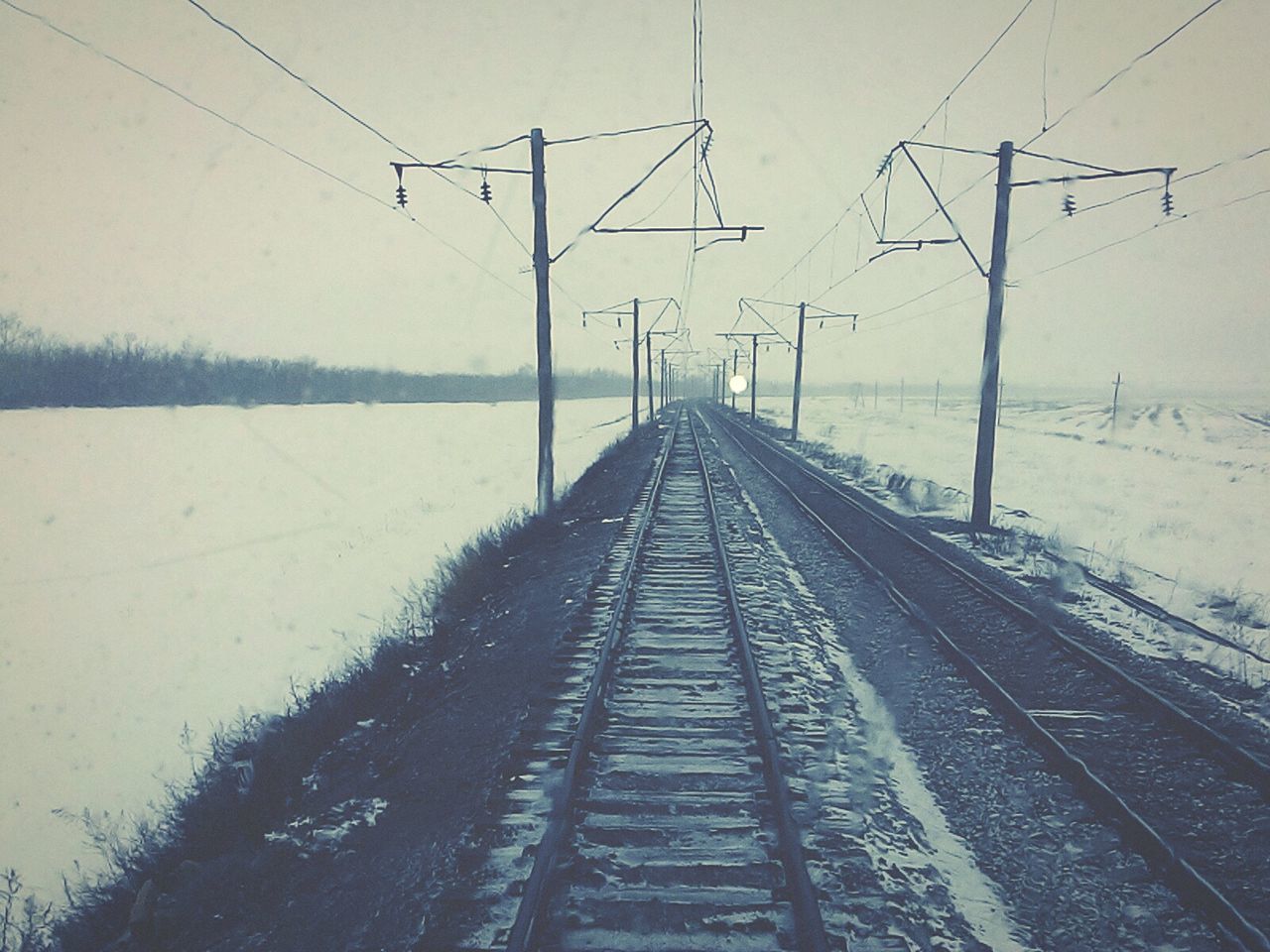 the way forward, electricity pylon, diminishing perspective, power line, vanishing point, winter, snow, transportation, cold temperature, clear sky, electricity, road, sky, weather, connection, power supply, fuel and power generation, long, season, cable