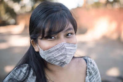Close-up portrait of young woman