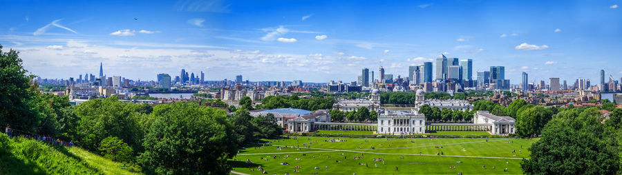 High angle view of trees and buildings against sky