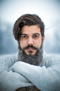 Portrait of bearded young man during winter