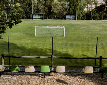 Empty benches on soccer field