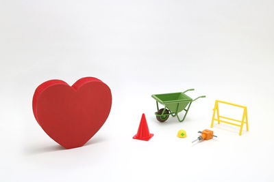 Close-up of heart shape over white background
