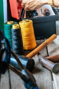 Close-up of worker working on table