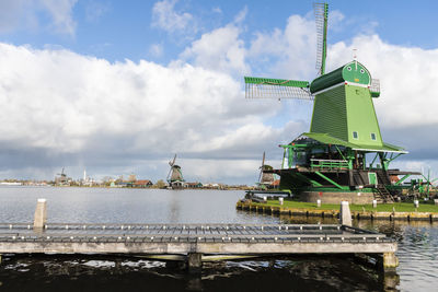 Traditional windmill against sky