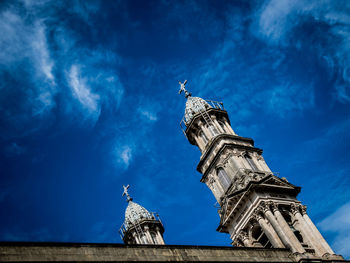 Low angle view of church against blue sky