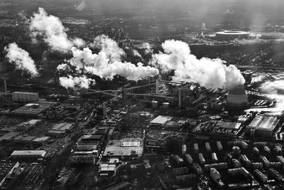 High angle view of smoke emitting from factory