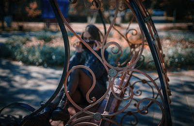 Close-up portrait of young man on metal