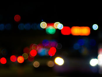 Defocused image of illuminated lights at night