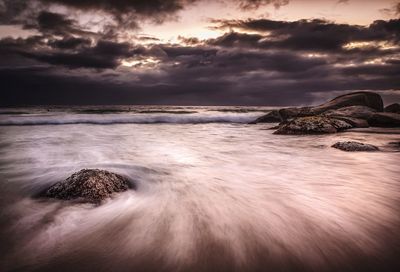 Scenic view of sea against sky during sunset