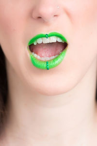 Cropped image of woman with green lipstick