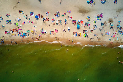 Aerial view of sea landscape with crowded sand beach in wladyslawowo. baltic sea coastline 