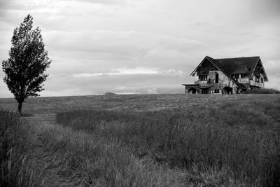 House on field against sky