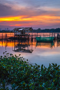 Scenic view of bridge against sky during sunset