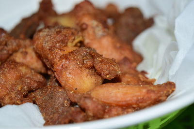 Close-up of meat in plate on table