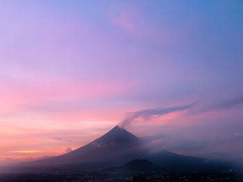 Scenic view of mountains against sky during sunset