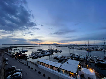 Alguer harbor during sunset, lights clouds and landscape are making this place special