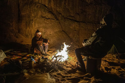 Close-up of woman standing in cave