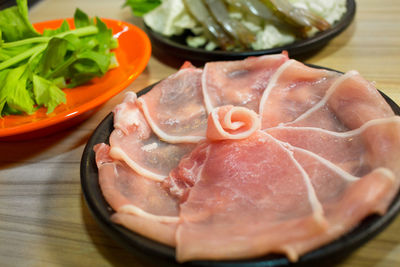 High angle view of meat in plate on table