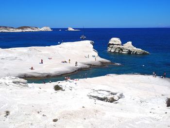 Scenic view of sea against clear blue sky