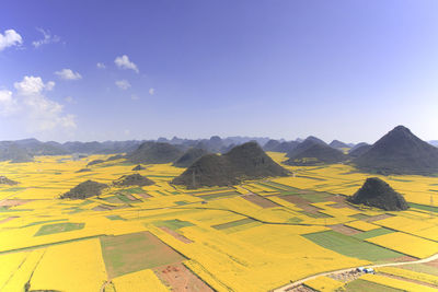 High angle view of fields against sky